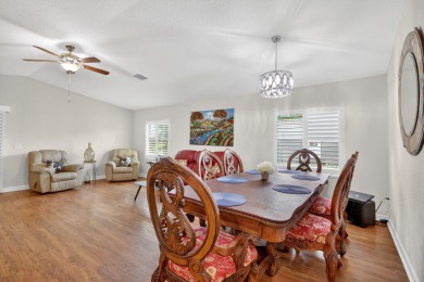 Enjoy gorgeous lake views from this gently lived-in home in a on Spanish Lakes Fairways in Florida - for sale on GolfHomes.com, golf home, golf lot