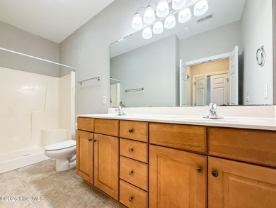 Charming 2-bedroom, 2-bath townhome in the highly desirable on Magnolia Greens Golf Plantation in North Carolina - for sale on GolfHomes.com, golf home, golf lot