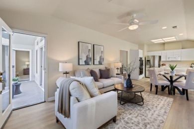 This elegant & spacious, SINGLE LEVEL, END UNIT home with 2 on Villages Golf and Country Club in California - for sale on GolfHomes.com, golf home, golf lot