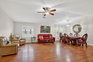 Enjoy gorgeous lake views from this gently lived-in home in a on Spanish Lakes Fairways in Florida - for sale on GolfHomes.com, golf home, golf lot