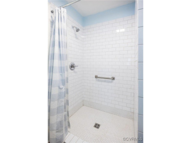 Discover the perfect blend of low-maintenance living and on Country Club of Petersburg in Virginia - for sale on GolfHomes.com, golf home, golf lot