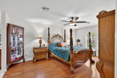 Enjoy gorgeous lake views from this gently lived-in home in a on Spanish Lakes Fairways in Florida - for sale on GolfHomes.com, golf home, golf lot