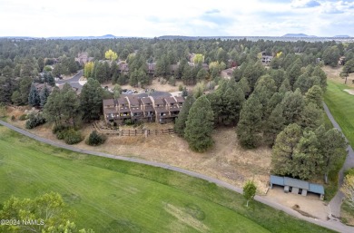 Welcome to this perfectly placed townhome in the peaceful, tree on Aspen Valley Golf Club in Arizona - for sale on GolfHomes.com, golf home, golf lot