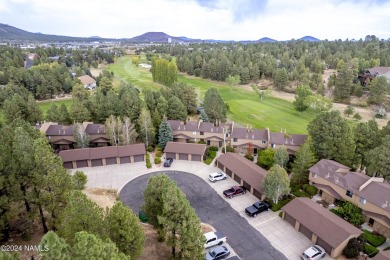 Welcome to this perfectly placed townhome in the peaceful, tree on Aspen Valley Golf Club in Arizona - for sale on GolfHomes.com, golf home, golf lot