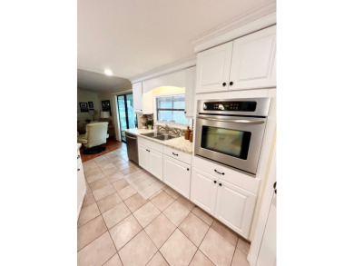 From the moment you walk through the door, you'll fall in love on Pine Lakes Country Club in Florida - for sale on GolfHomes.com, golf home, golf lot