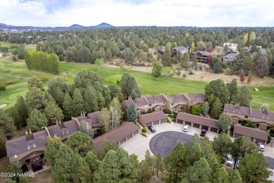 Welcome to this perfectly placed townhome in the peaceful, tree on Aspen Valley Golf Club in Arizona - for sale on GolfHomes.com, golf home, golf lot