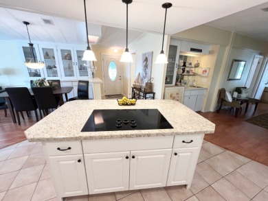 From the moment you walk through the door, you'll fall in love on Pine Lakes Country Club in Florida - for sale on GolfHomes.com, golf home, golf lot