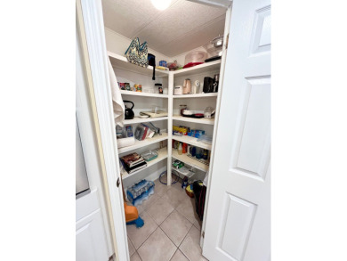 From the moment you walk through the door, you'll fall in love on Pine Lakes Country Club in Florida - for sale on GolfHomes.com, golf home, golf lot