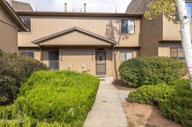 Welcome to this perfectly placed townhome in the peaceful, tree on Aspen Valley Golf Club in Arizona - for sale on GolfHomes.com, golf home, golf lot