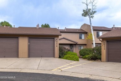 Welcome to this perfectly placed townhome in the peaceful, tree on Aspen Valley Golf Club in Arizona - for sale on GolfHomes.com, golf home, golf lot