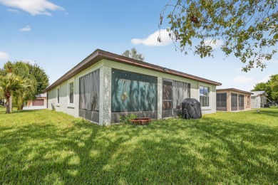 Enjoy gorgeous lake views from this gently lived-in home in a on Spanish Lakes Fairways in Florida - for sale on GolfHomes.com, golf home, golf lot