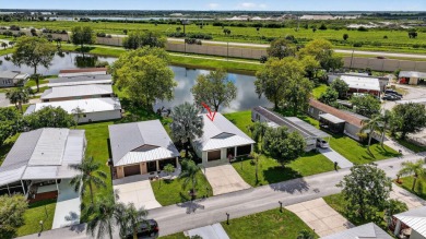 Enjoy gorgeous lake views from this gently lived-in home in a on Spanish Lakes Fairways in Florida - for sale on GolfHomes.com, golf home, golf lot