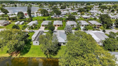 Enjoy gorgeous lake views from this gently lived-in home in a on Spanish Lakes Fairways in Florida - for sale on GolfHomes.com, golf home, golf lot