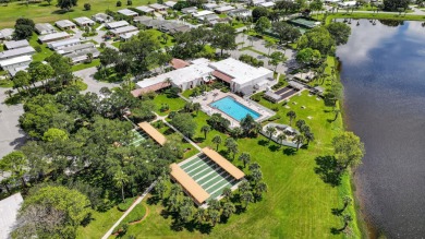 Enjoy gorgeous lake views from this gently lived-in home in a on Spanish Lakes Fairways in Florida - for sale on GolfHomes.com, golf home, golf lot