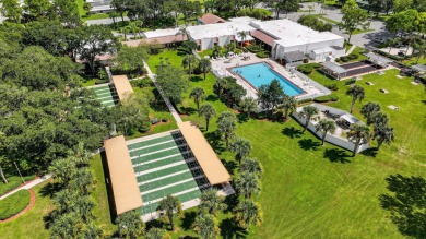 Enjoy gorgeous lake views from this gently lived-in home in a on Spanish Lakes Fairways in Florida - for sale on GolfHomes.com, golf home, golf lot