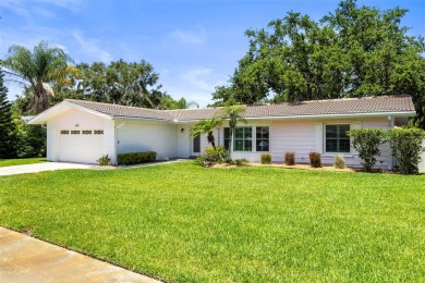 Welcome to your dream home in one of Dunedin's most desirable on The Dunedin Country Club in Florida - for sale on GolfHomes.com, golf home, golf lot