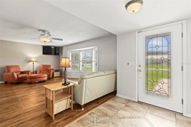 Welcome to your dream home in one of Dunedin's most desirable on The Dunedin Country Club in Florida - for sale on GolfHomes.com, golf home, golf lot