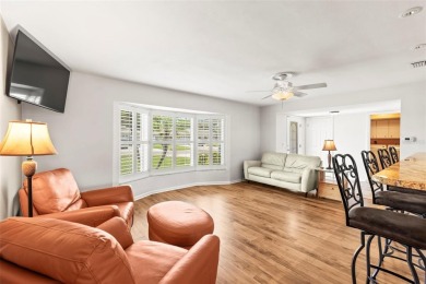 Welcome to your dream home in one of Dunedin's most desirable on The Dunedin Country Club in Florida - for sale on GolfHomes.com, golf home, golf lot