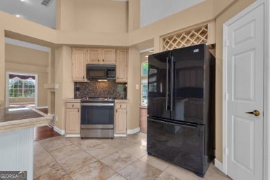 Tucked within the heart of Peachtree City's beloved Kenton Place on Braelinn Golf Club in Georgia - for sale on GolfHomes.com, golf home, golf lot