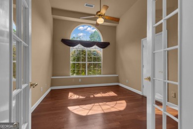 Tucked within the heart of Peachtree City's beloved Kenton Place on Braelinn Golf Club in Georgia - for sale on GolfHomes.com, golf home, golf lot
