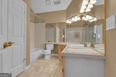 Tucked within the heart of Peachtree City's beloved Kenton Place on Braelinn Golf Club in Georgia - for sale on GolfHomes.com, golf home, golf lot