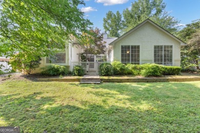 Tucked within the heart of Peachtree City's beloved Kenton Place on Braelinn Golf Club in Georgia - for sale on GolfHomes.com, golf home, golf lot