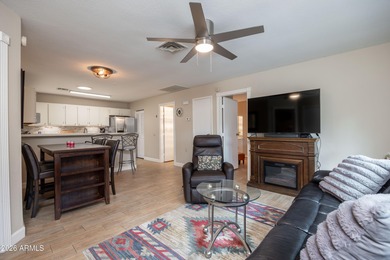 Beautifully appointed and meticulously maintained, this on Sun Village Golf Course in Arizona - for sale on GolfHomes.com, golf home, golf lot