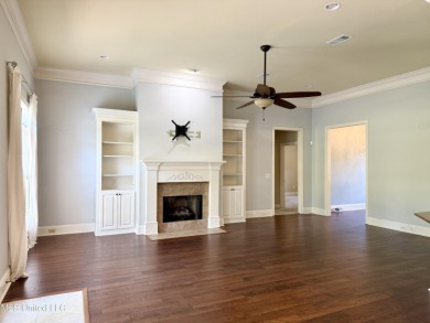 This inviting home sits on the Whisper Lake Golf Course in the on Annandale Golf Club in Mississippi - for sale on GolfHomes.com, golf home, golf lot