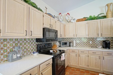 Beautiful three bedroom three bathroom custom home positioned on on Meadowood Golf and Tennis Club in Florida - for sale on GolfHomes.com, golf home, golf lot