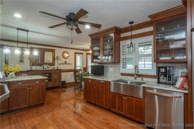 Beautifully renovated in 2022, this 3-bedroom, 2-bath golf on Cypress Lakes Golf Course in North Carolina - for sale on GolfHomes.com, golf home, golf lot