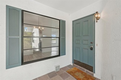 Welcome to this stunning 2-bedroom, 2-bath waterfront home on Caloosa Greens Executive Golf Course in Florida - for sale on GolfHomes.com, golf home, golf lot