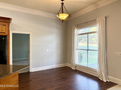 This inviting home sits on the Whisper Lake Golf Course in the on Annandale Golf Club in Mississippi - for sale on GolfHomes.com, golf home, golf lot