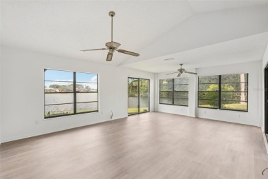 Welcome to this stunning 2-bedroom, 2-bath waterfront home on Caloosa Greens Executive Golf Course in Florida - for sale on GolfHomes.com, golf home, golf lot