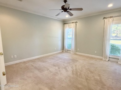 This inviting home sits on the Whisper Lake Golf Course in the on Annandale Golf Club in Mississippi - for sale on GolfHomes.com, golf home, golf lot