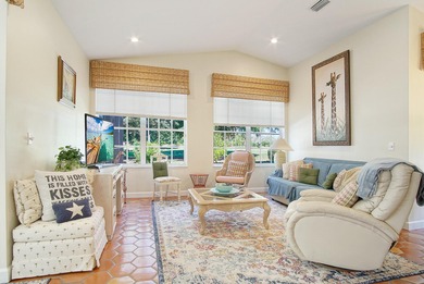 Beautiful three bedroom three bathroom custom home positioned on on Meadowood Golf and Tennis Club in Florida - for sale on GolfHomes.com, golf home, golf lot