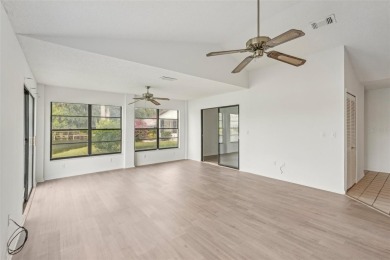 Welcome to this stunning 2-bedroom, 2-bath waterfront home on Caloosa Greens Executive Golf Course in Florida - for sale on GolfHomes.com, golf home, golf lot