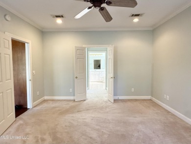This inviting home sits on the Whisper Lake Golf Course in the on Annandale Golf Club in Mississippi - for sale on GolfHomes.com, golf home, golf lot