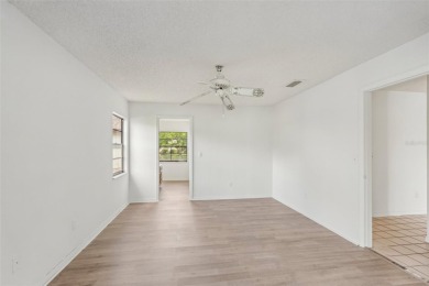 Welcome to this stunning 2-bedroom, 2-bath waterfront home on Caloosa Greens Executive Golf Course in Florida - for sale on GolfHomes.com, golf home, golf lot