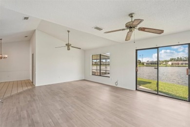 Welcome to this stunning 2-bedroom, 2-bath waterfront home on Caloosa Greens Executive Golf Course in Florida - for sale on GolfHomes.com, golf home, golf lot