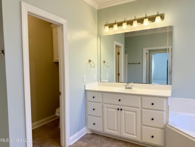 This inviting home sits on the Whisper Lake Golf Course in the on Annandale Golf Club in Mississippi - for sale on GolfHomes.com, golf home, golf lot