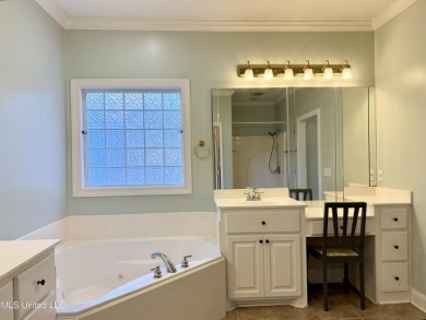 This inviting home sits on the Whisper Lake Golf Course in the on Annandale Golf Club in Mississippi - for sale on GolfHomes.com, golf home, golf lot