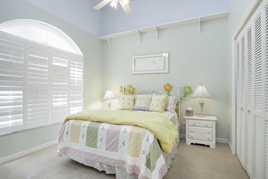 Beautiful three bedroom three bathroom custom home positioned on on Meadowood Golf and Tennis Club in Florida - for sale on GolfHomes.com, golf home, golf lot