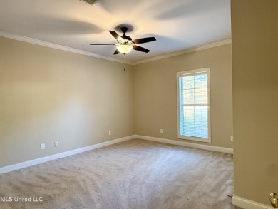 This inviting home sits on the Whisper Lake Golf Course in the on Annandale Golf Club in Mississippi - for sale on GolfHomes.com, golf home, golf lot