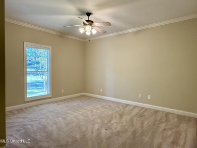 This inviting home sits on the Whisper Lake Golf Course in the on Annandale Golf Club in Mississippi - for sale on GolfHomes.com, golf home, golf lot