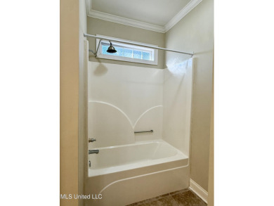 This inviting home sits on the Whisper Lake Golf Course in the on Annandale Golf Club in Mississippi - for sale on GolfHomes.com, golf home, golf lot