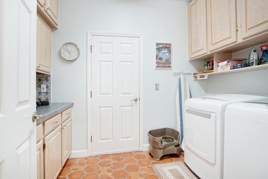 Beautiful three bedroom three bathroom custom home positioned on on Meadowood Golf and Tennis Club in Florida - for sale on GolfHomes.com, golf home, golf lot