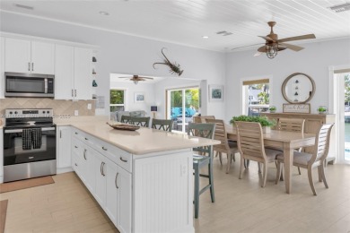 This Key Colony Beach coastal retreat blends modern elegance on Key Colony Beach Golf Course in Florida - for sale on GolfHomes.com, golf home, golf lot
