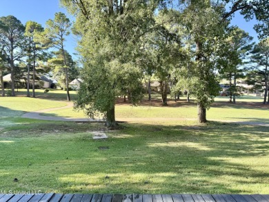 This inviting home sits on the Whisper Lake Golf Course in the on Annandale Golf Club in Mississippi - for sale on GolfHomes.com, golf home, golf lot