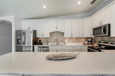 This Key Colony Beach coastal retreat blends modern elegance on Key Colony Beach Golf Course in Florida - for sale on GolfHomes.com, golf home, golf lot