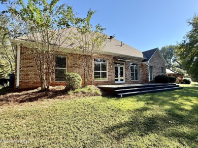 This inviting home sits on the Whisper Lake Golf Course in the on Annandale Golf Club in Mississippi - for sale on GolfHomes.com, golf home, golf lot